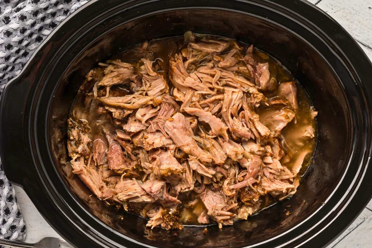 pork roast shredded in slow cooker.
