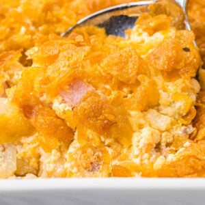 close up of scoop of potato casserole.