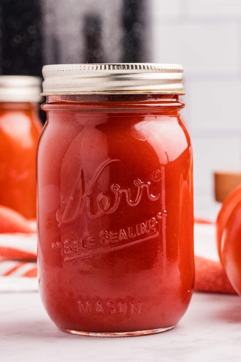 finished tomato sauce jars on counter.