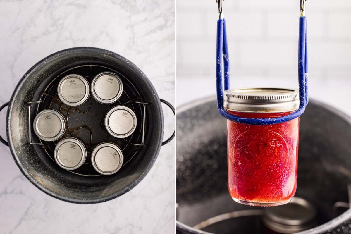Mason jars in a water bath canner and one jar being lifted out.