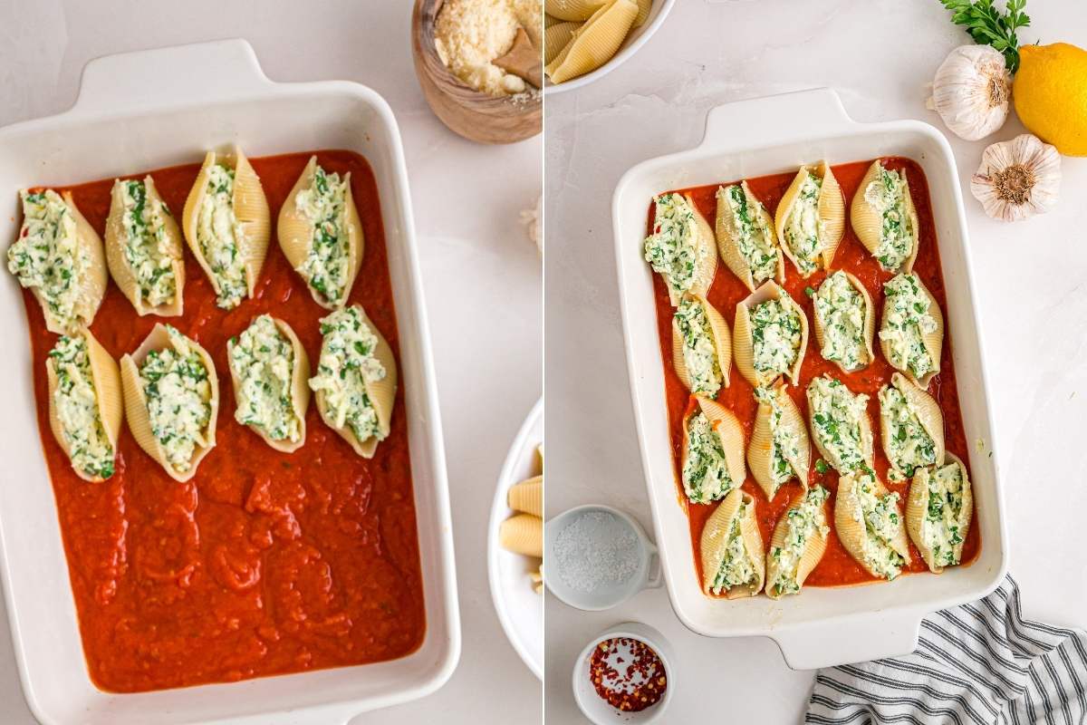 Stuffed pasta shells arranged over marinara in baking dish.