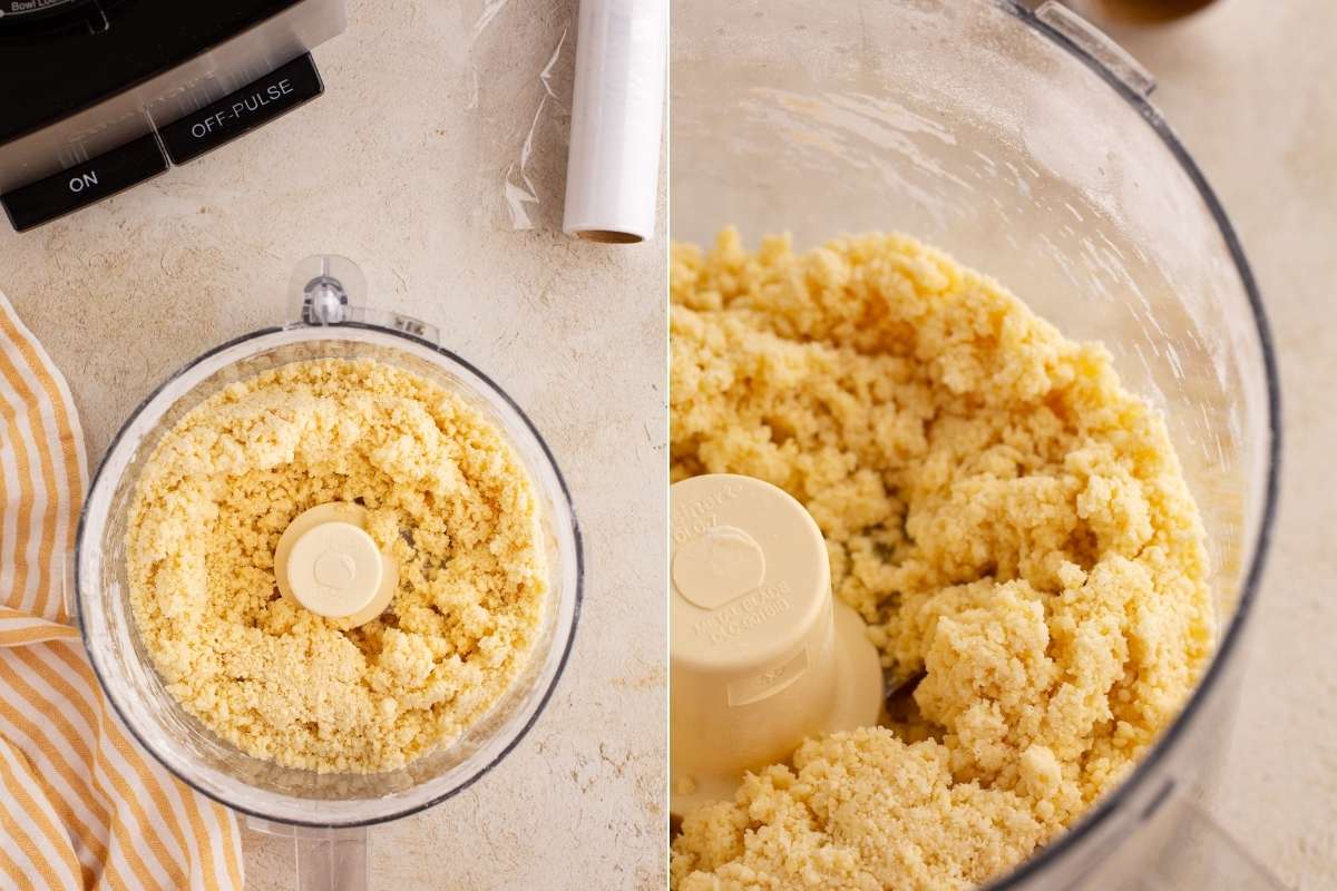 Food processor making pastry dough with flour, butter, egg yolk and water.