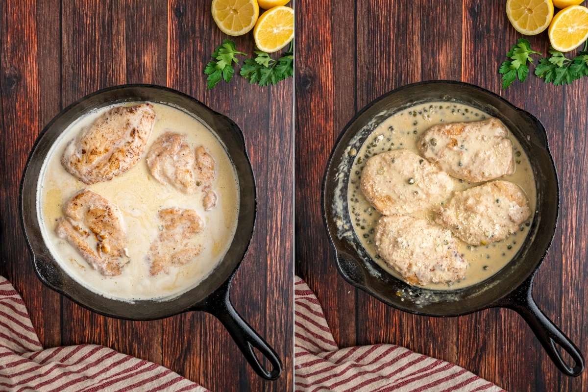 Chicken simmering in cream sauce inside a cast iron skillet.
