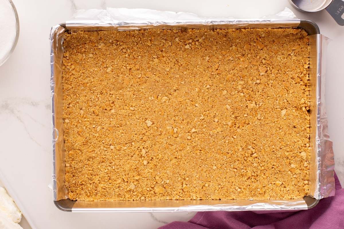graham cracker crumb crust pressed into. pan
