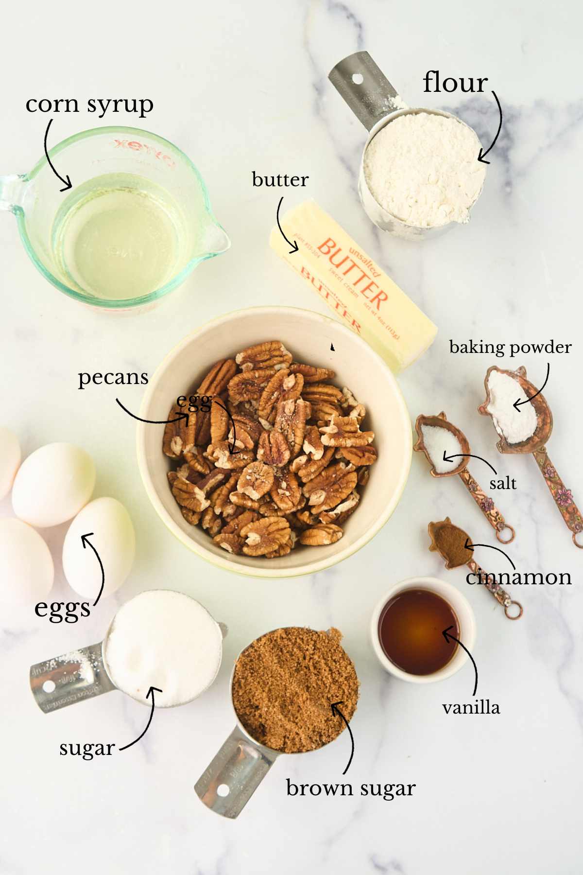 labeled ingredients on marble surface.