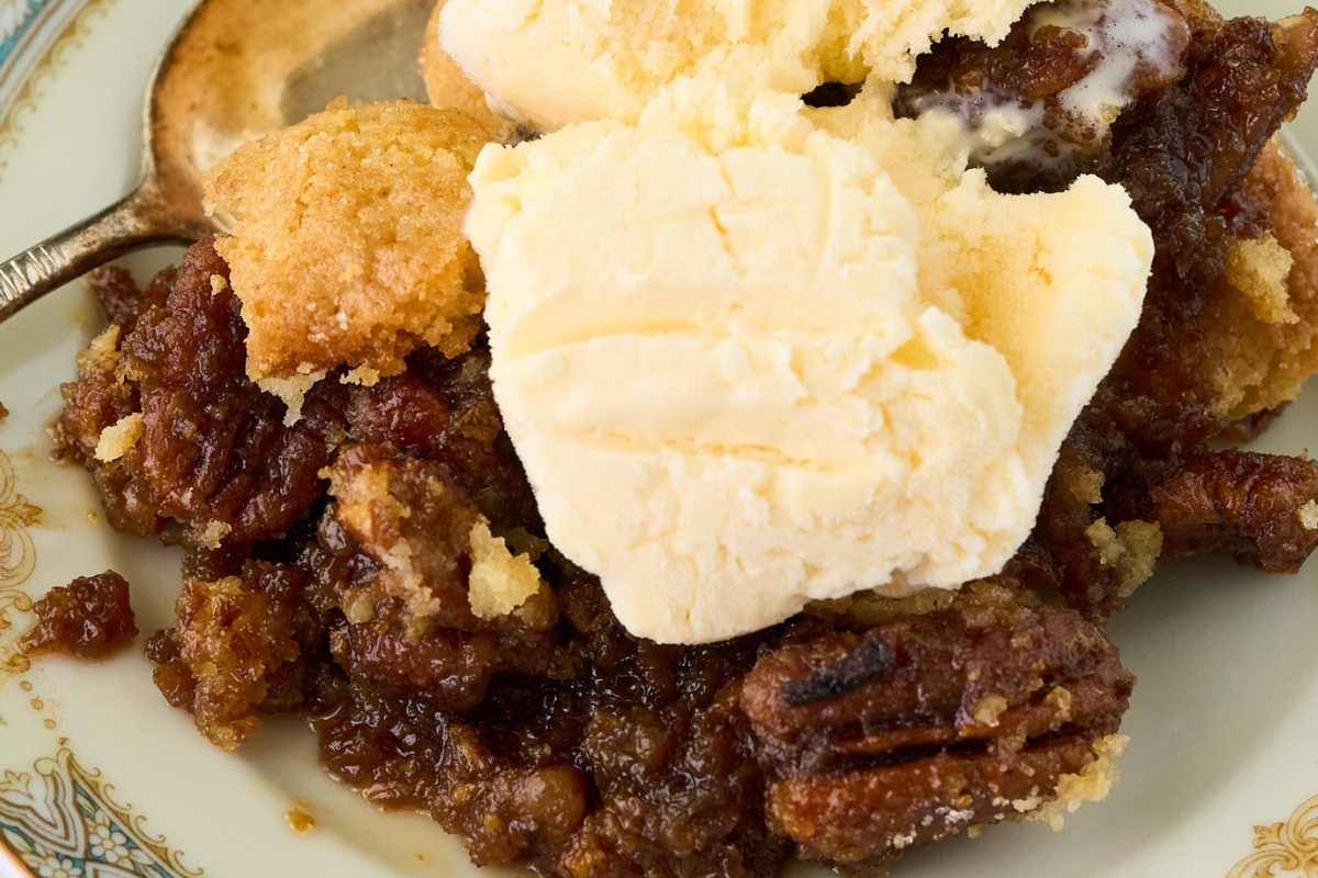 plated cobbler with ice cream on top.