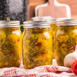 jars on white and red towel.