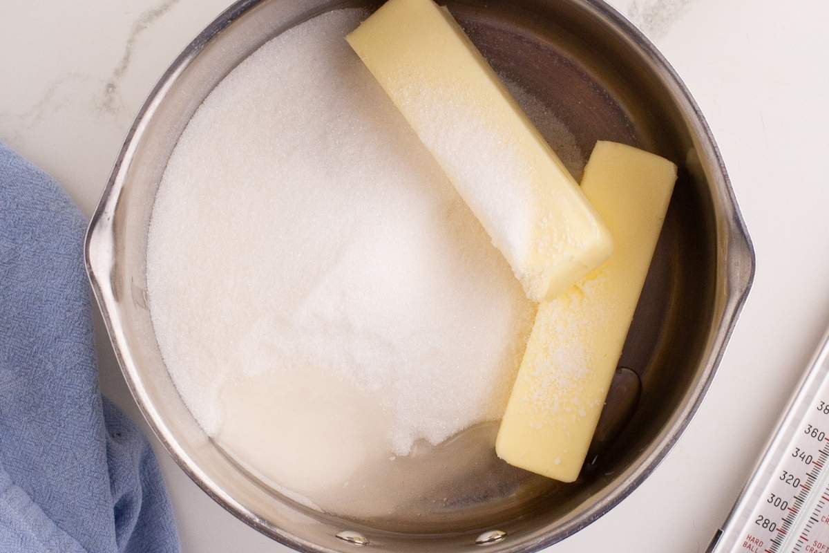 Butter and sugar in a saucepan before cooking.