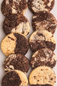 12 finished marble shortbread cookies.