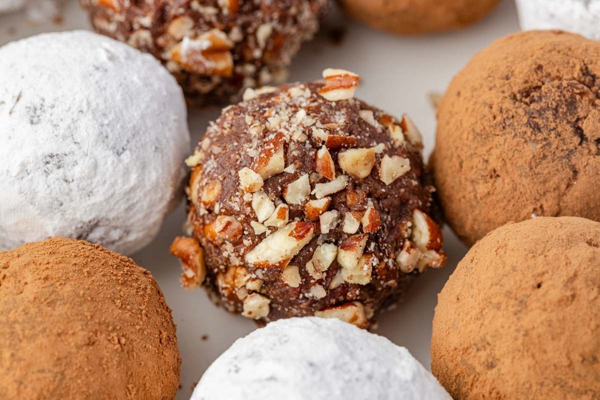Close-up of bourbon balls showing texture and coatings.