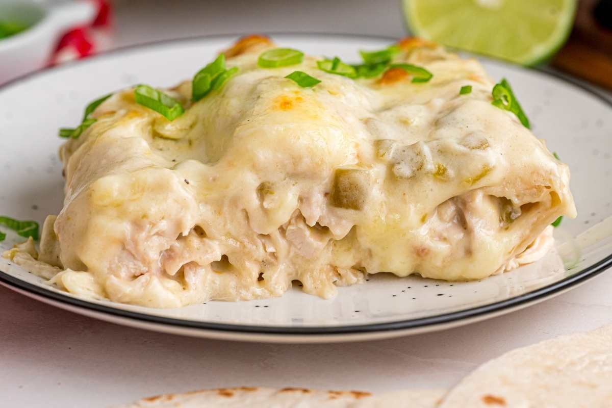 side view of enchiladas on plate.