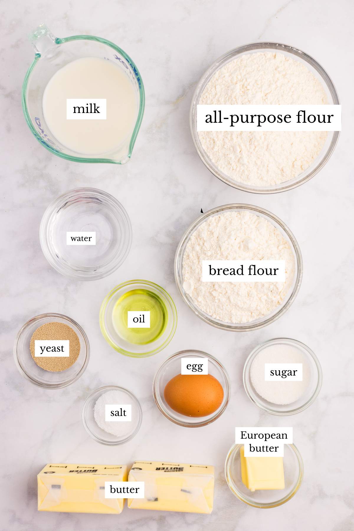 labeled ingredients on marble counter.