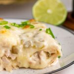 side view of finished chicken enchiladas.