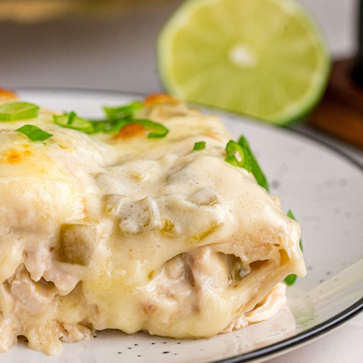 side view of finished chicken enchiladas.