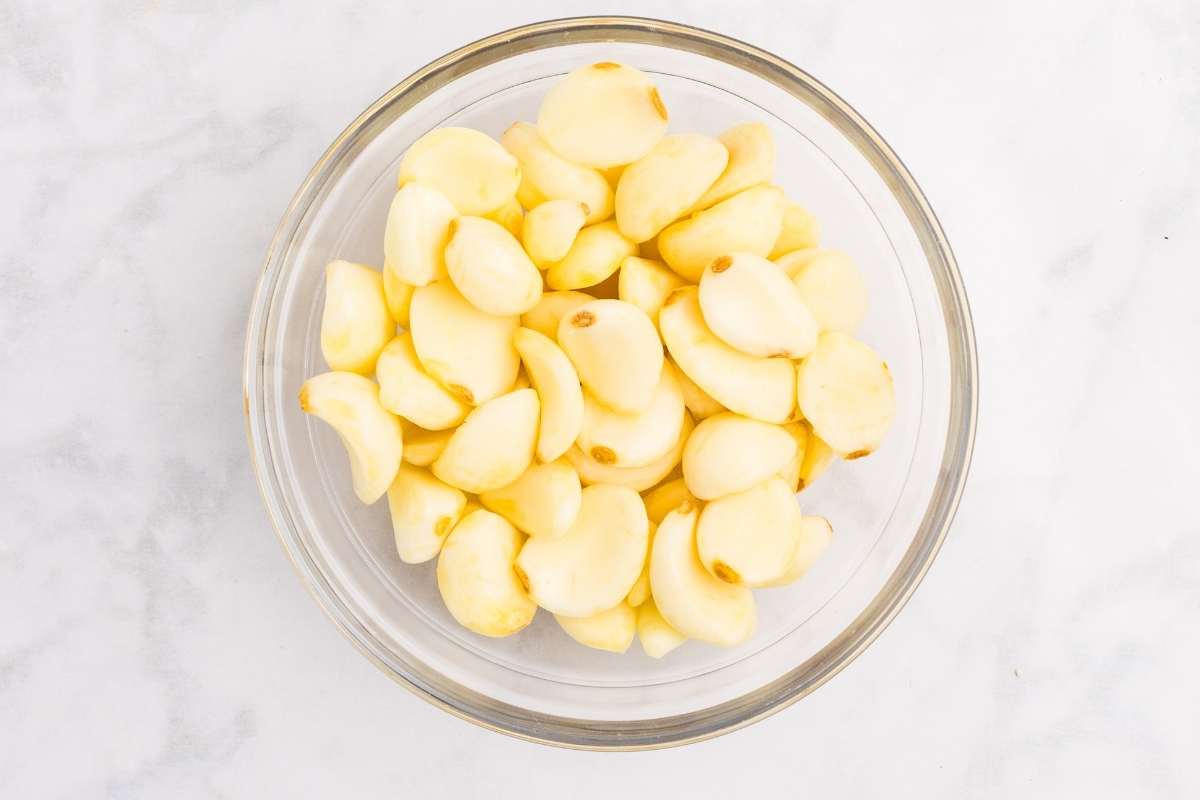 Bowl of peeled garlic cloves.