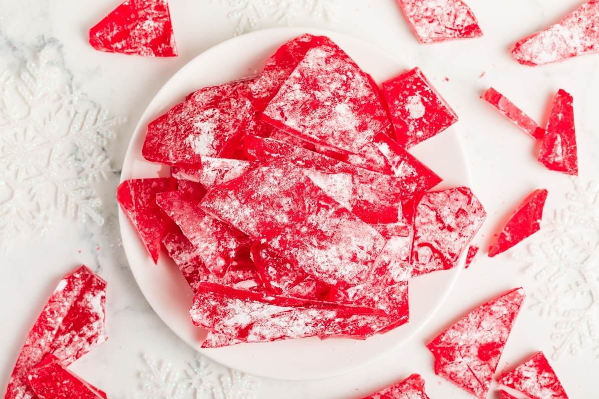 Overhead view of plated finished candy on a white background.