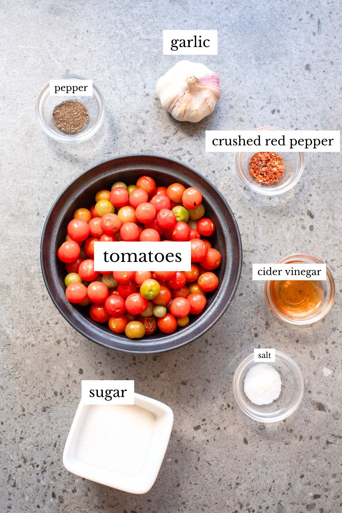Ingredients for tomato jam arranged on counter.