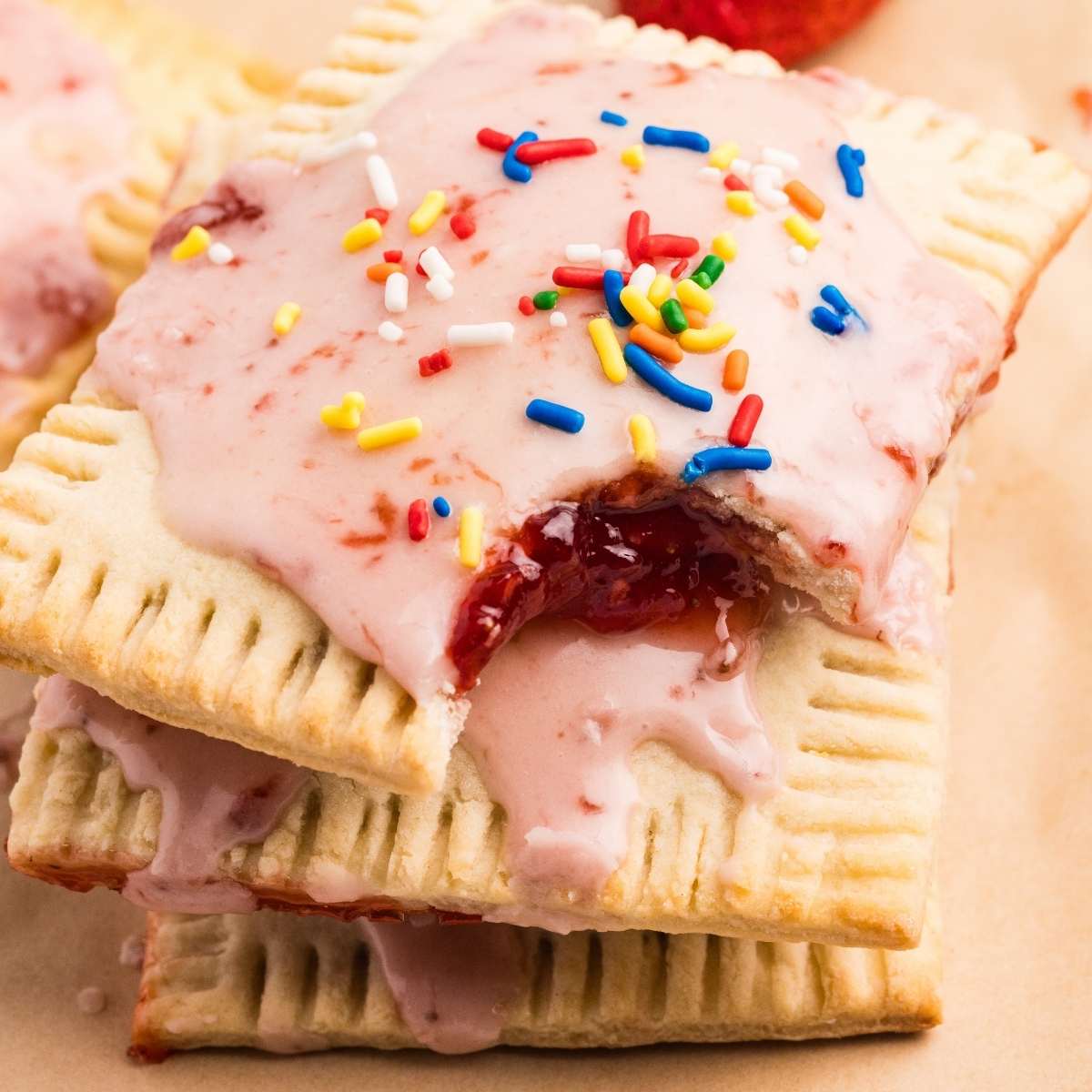 stack of pop tarts with bite missing.