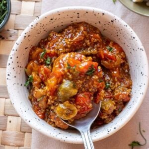 close up of tomato jam in white bowl.