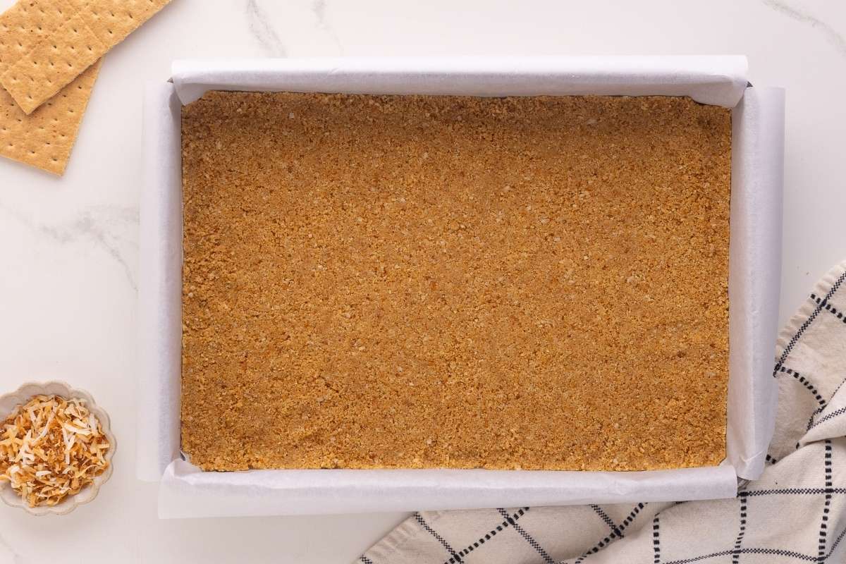 finished crust in casserole dish lined with parchment.