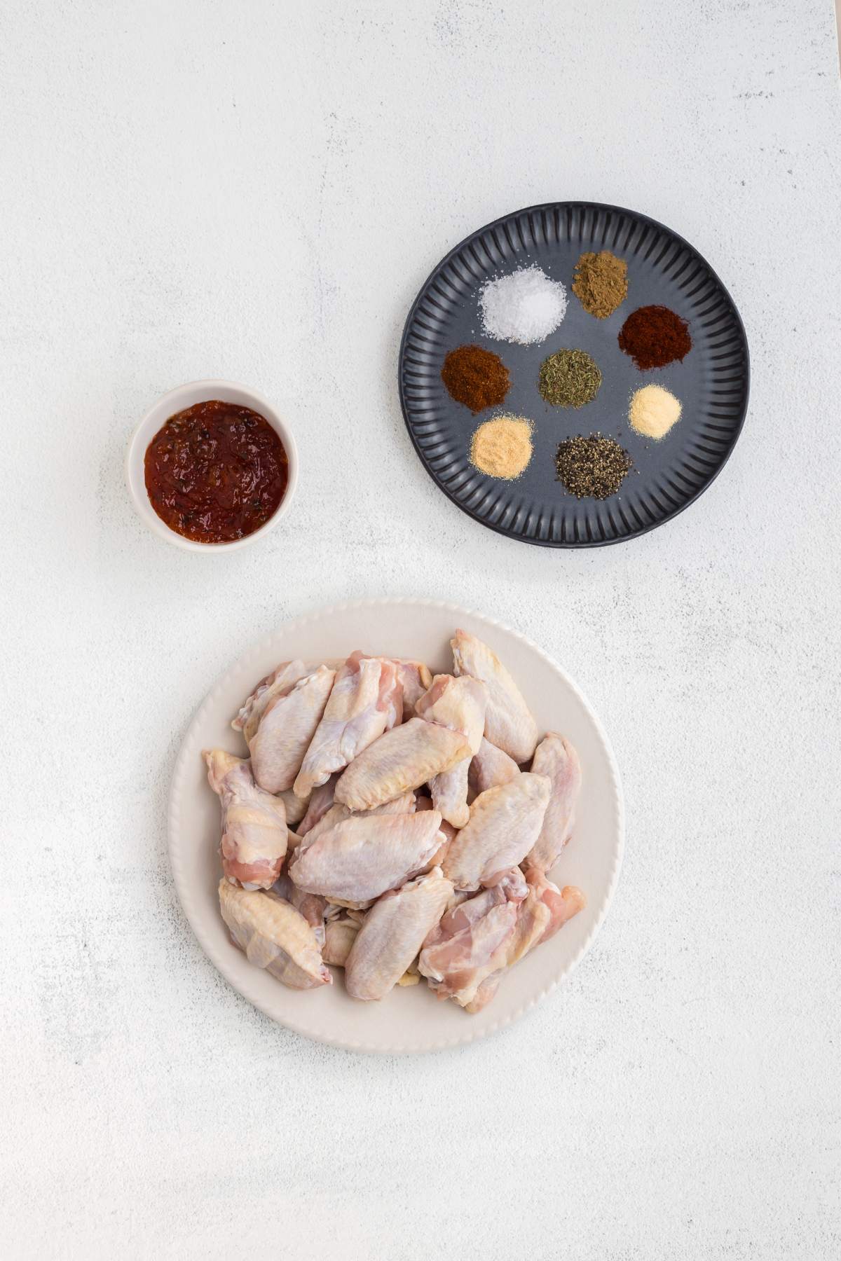 Ingredients measured out on a white counter.