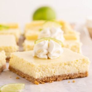 key lime cheesecake bars garnished