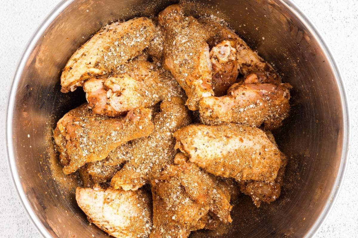 Uncooked wings in mixing bowl; tossed in dry rub.