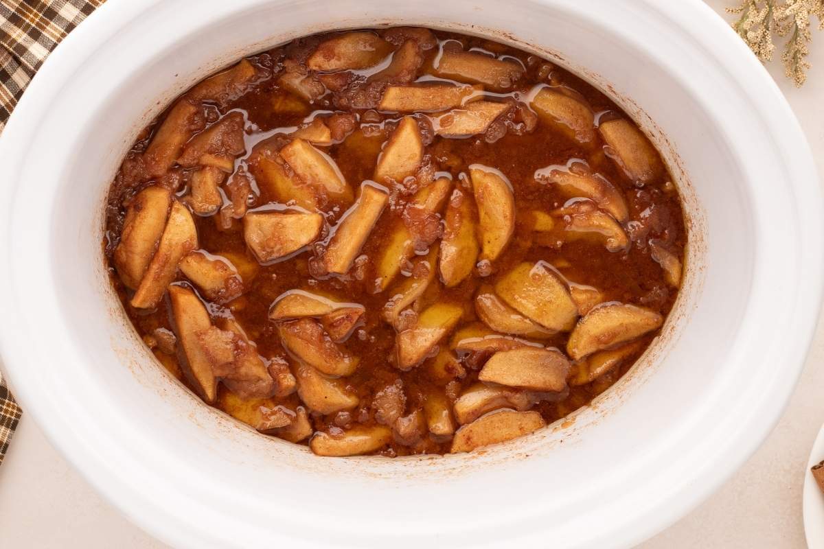 finished cooked apples in slow cooker.