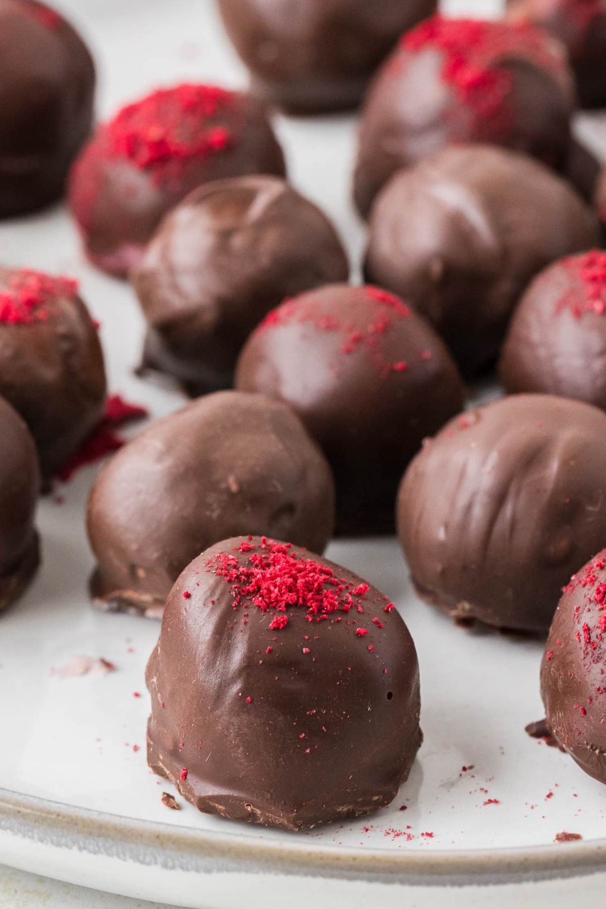lots of truffles on white background.