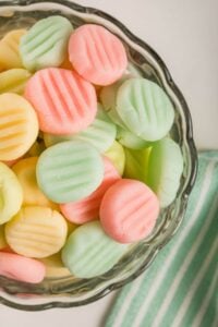 overhead view of homemade mints in glass bowl.