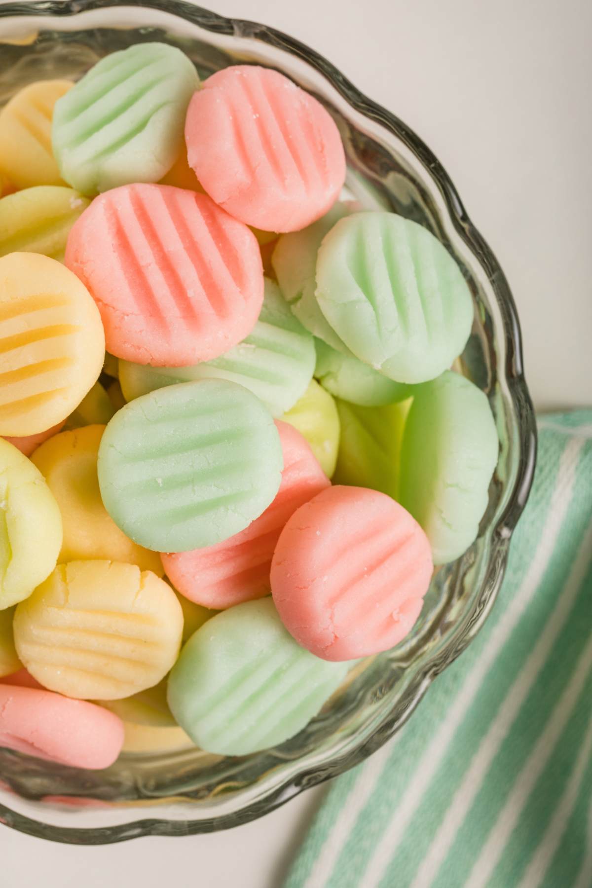 overhead view of homemade mints in glass bowl.