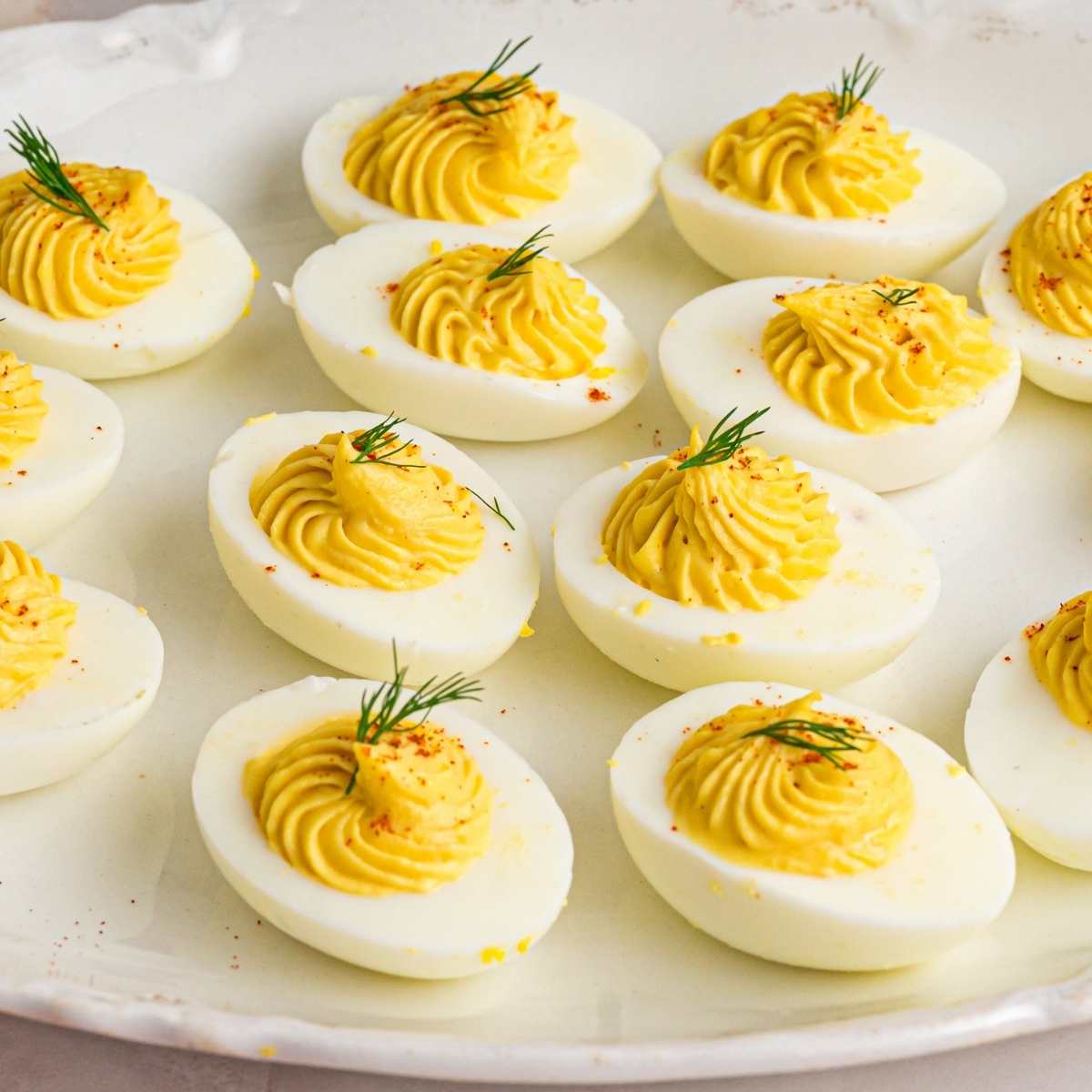 plated deviled eggs with piped filling.