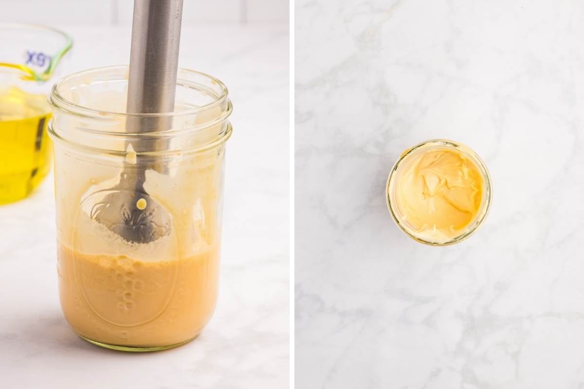 Immersion blender emulsifying mayonnaise in a mason jar beside finished creamy mayo viewed from above.