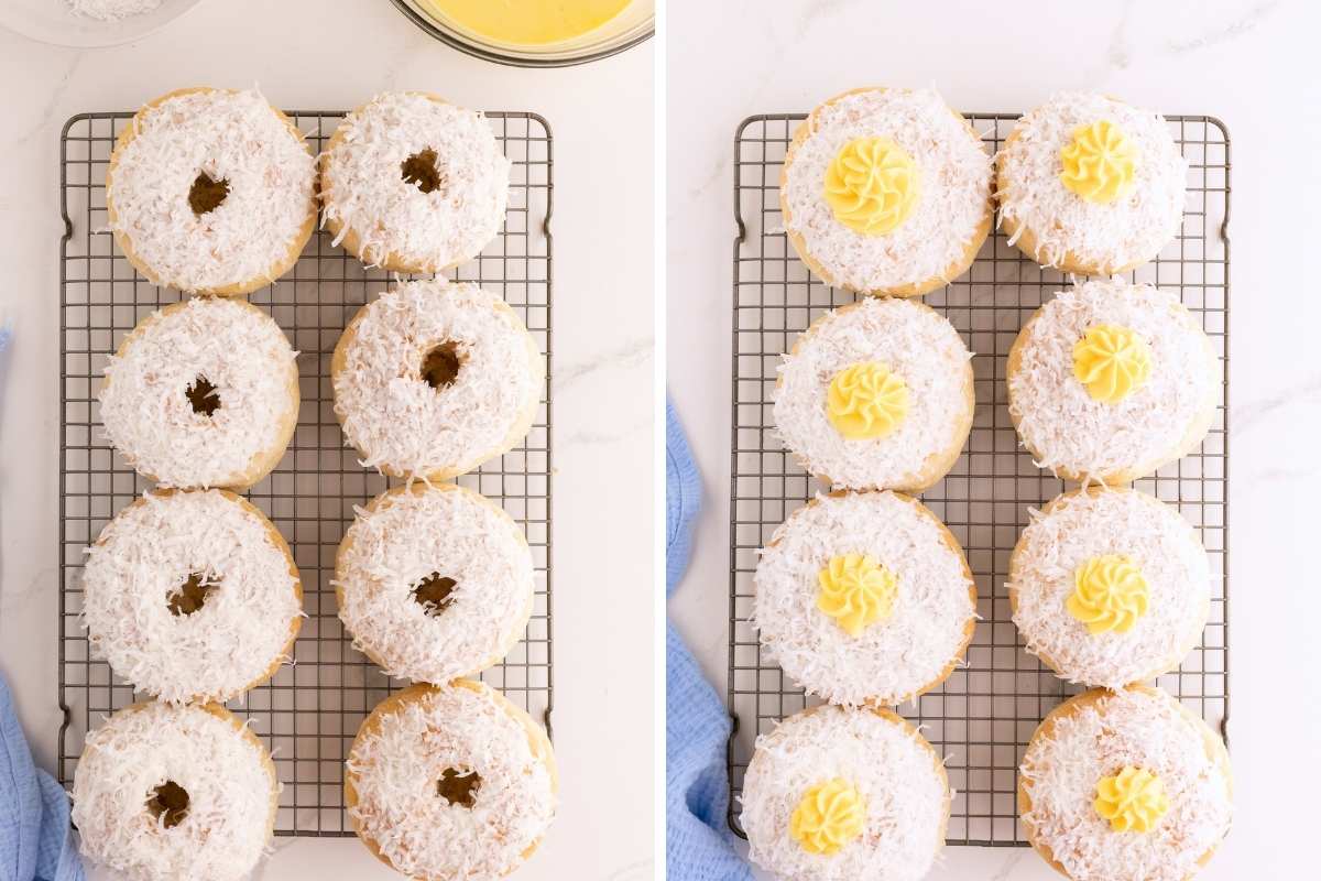 Coconut-coated buns on a wire rack with hollow centers being filled with yellow custard piped in swirls.