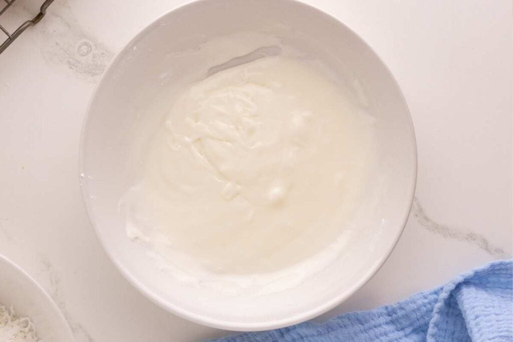 school bread glaze in a white bowl