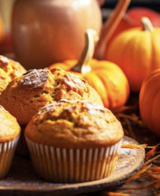 pumpkin muffin on plate.