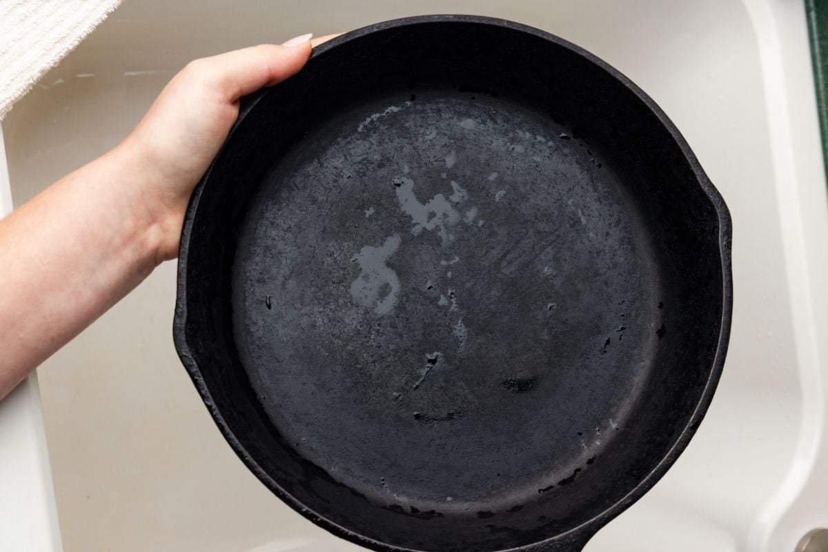 dirty cast iron skillet overhead view.