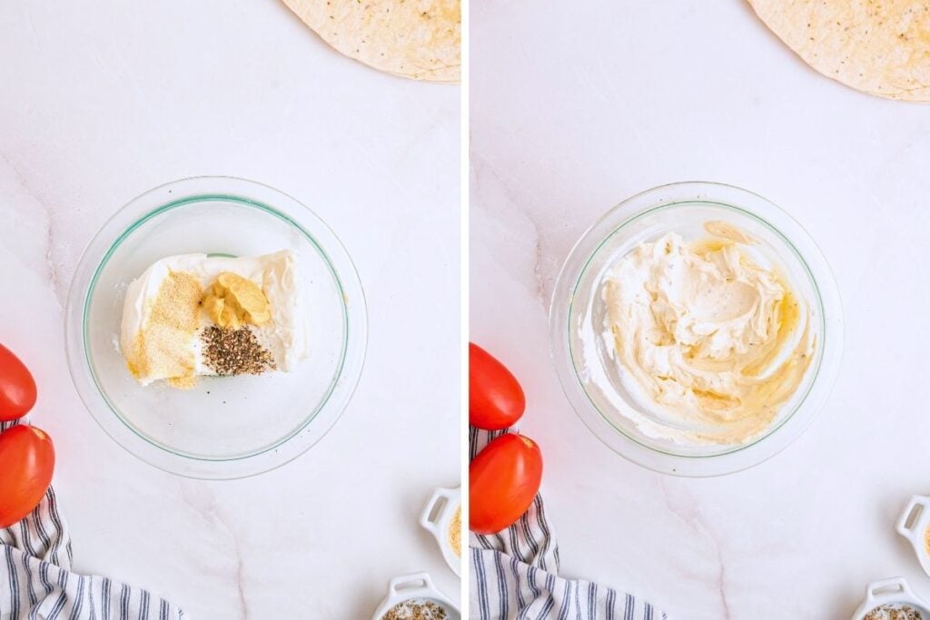 Cream cheese being combined with mustard and seasonings in a glass bowl, then whipped smooth.
