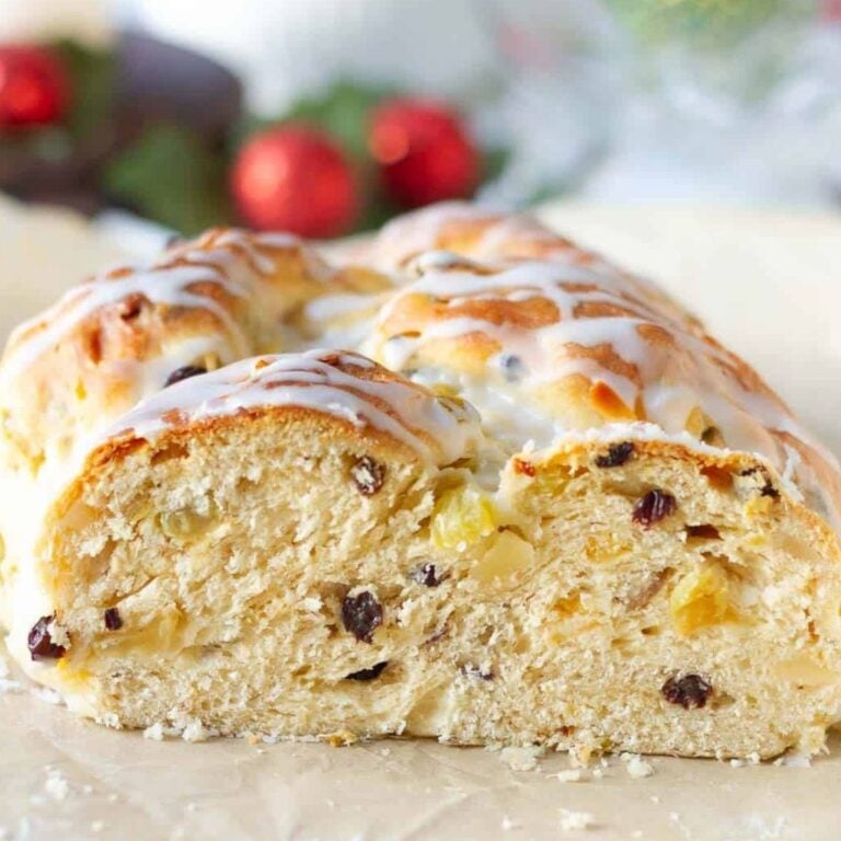 stollen bread with dried fruits and glaze on top