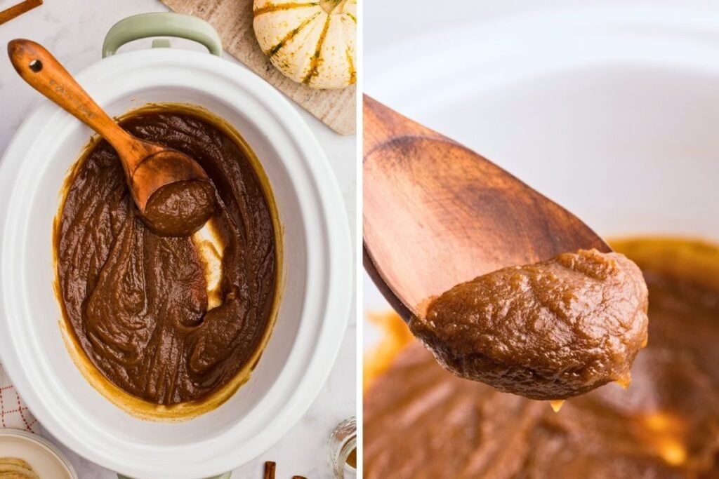 Thick glossy pumpkin butter in a white slow cooker with a wooden spoon lifting a dollop.