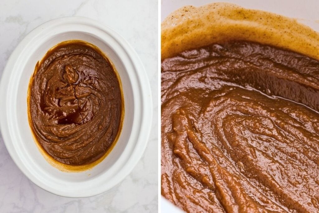 Thick glossy pumpkin butter swirled in a white slow cooker crock after stirring in vanilla.